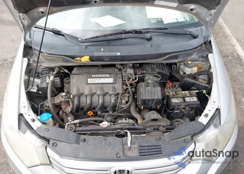 2010 Honda Insight Lx from USA, damaged, VIN JHMZE2H52AS011638